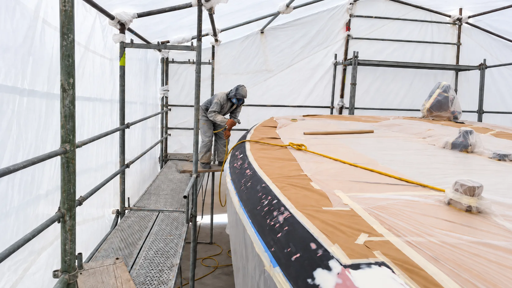 Hull refinishing works under supervision