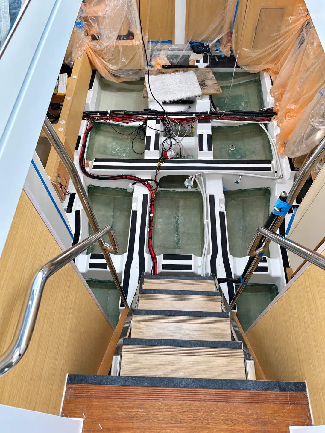 Interior hull structure and wiring inspected from the bilge during a yacht structural survey