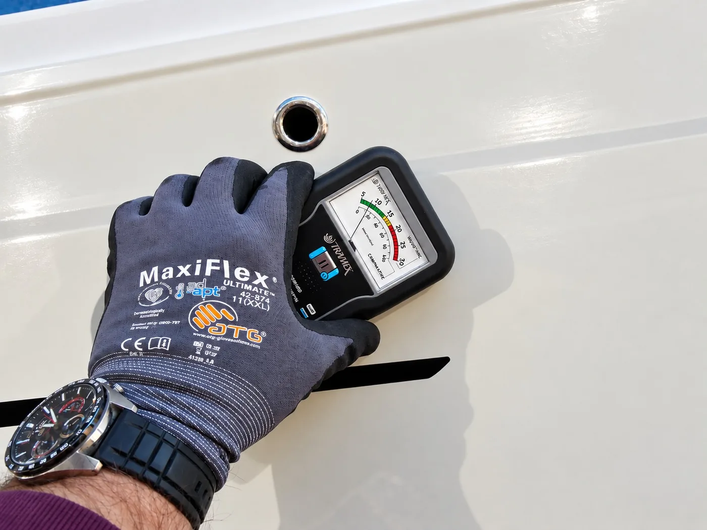 Moisture meter used on a GRP yacht hull during moisture investigation