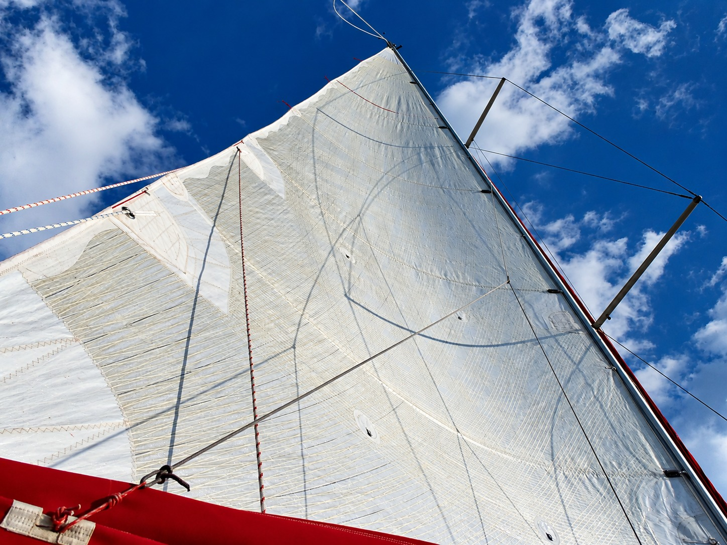 Sailing yacht rig and sails assessed under way during a sea trial