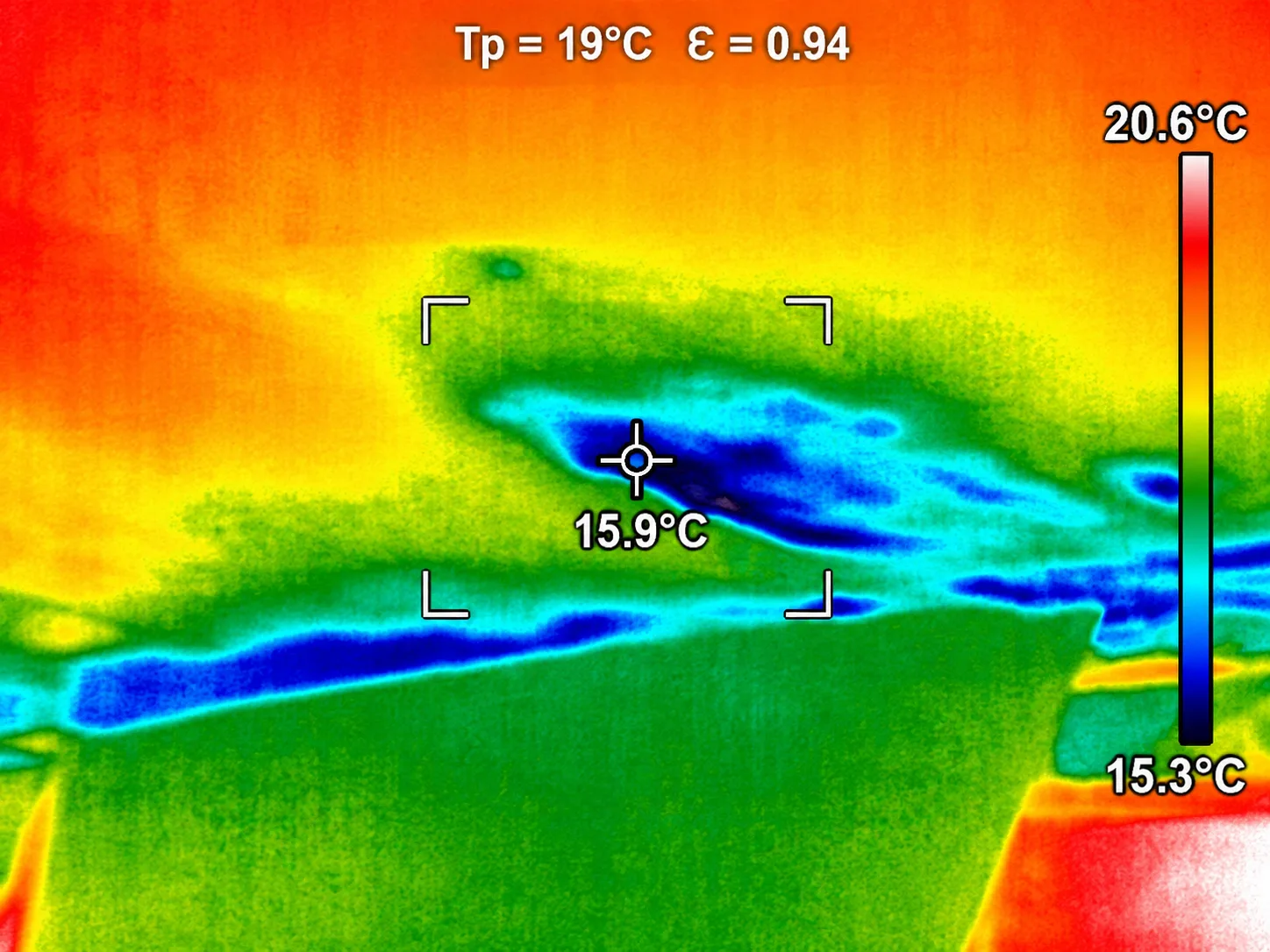 Thermal image of a yacht hull showing surface temperature patterns during inspection